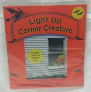 LIGHT UP EYES CORNER CREATURE MONSTER WINDOW DECAL DECOR INDOOR OUTDOOR NIP