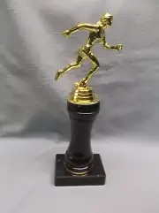 female TRACK trophy award turned wood column black marble base award
