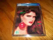 DECEMBER 1986 PLAYBOY CGC GRADE 8.0 BROOKE SHIELDS LAURIE CARR UNIVERSAL GRADE