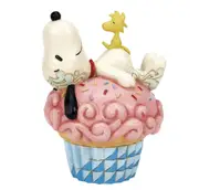 Peanuts by Jim Shore - Snoopy Laying on Cupcake