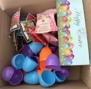 Box of Large Easter Eggs, Toys, Candy and Snacks.
