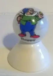 HAP PY FROM SN OW WHI TE AND THE 7 DWA RFS CARTOON CHARACTER ON WHITE MARBLE