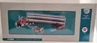 Corgi Kenworth W925 with Pipe Load, Dolly & Mutt Jeep US55704