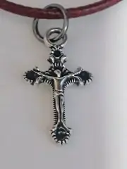 SILVER CROSS PENDANT ON RED LEATHER CORD, LOBSTER CLASP.