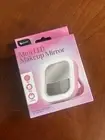 Pink Glow Mini Travel LED Makeup Mirror with Pop-Out Stand