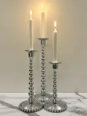 MARIPOSA TRIO OF CAST ALUMINUM “PEARLED CANDLESTICKS” GRADUATED SIZES