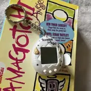 RARE Ice Grey Tamagotchi Angel Bandai 1997 GOLD WINGS