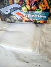 60 metres Vacuum Sealer Rolls (12 x 5 metres) plus 50 pre-made Bags 30cm x 22cm