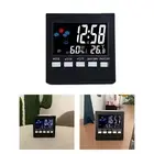 Digital backlight thermometer and hygrometer with voiceactivated feature