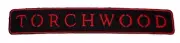 DW TORCHWOOD Red/Black Name Logo 5" Wide Iron On PATCH