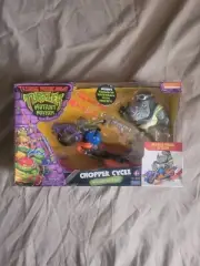 Playmates - TMNT: Mutant Mayhem Chopper Cycle Rocksteady "READ"
