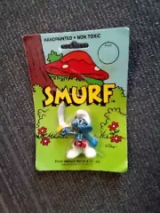SMURF SWORD with EYE PATCH. RARE DISPLAY FIGURE BRAND NEW PACKAGE 1982