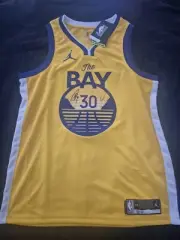 Front signed Steph Curry Yellow Statement Jersey