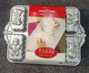 Nordic Ware Holiday Mini Loaf Pan