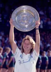 Steffi Graf of Germany lifts the trophy after defeating Martina N - Old Photo 8