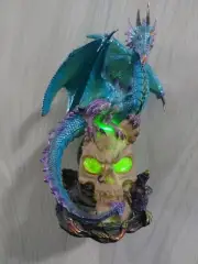Resin Dragon Assassin Perched On Skull Color Changing Light Up Decoration