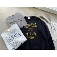 在飛比找蝦皮購物優惠-NIRVANA 幽靈大學T 秋冬必備 長袖 笑臉 寬鬆 情侶