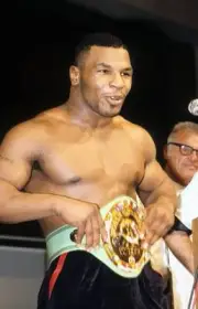 Mike Tyson Celebrates As He Tries On The Bel Old Boxing Photo