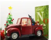 red truck snow globe