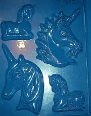 FOUR MEDIUM SIZED ASSORTED UNICORN SHAPES CHOCOLATE MOULD OR PLASTER MOULD