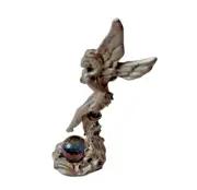 Pewter Fairy with Clear Crystal Sphere standing on a stump.