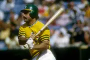 Sal Bando Oakland Athletics swings and watches the flight of his - 1974 Photo
