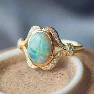 4Ct Oval Cut Lab Created Fire Opal Womens Engagement Ring 14k Yellow Gold Plated