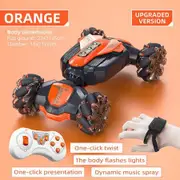 2.4G 4WD Remote Control Torsion Stunt Car Gesture Sensor Watch 360° Rotation Off-road with wheel Lights flashing & Music(Orange)