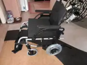 BRAND NEW BREEZY BASIX2 LIGHTWEIGHT TRANSIT WHEELCHAIR NEVER BEEN USED