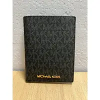 在飛比找蝦皮購物優惠-Michael Kors MK銀字防刮LOGO皮革掀式護照/