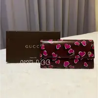 在飛比找蝦皮購物優惠-GUCCI  紫紅心跳愛心 金雙G 長夾 扣式 309702