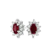 Oval Ruby and 0.33 CT. T.W. Diamond Sunburst Frame Stud Earrings in 14K White Gold