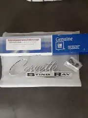 NOS 3797414 Corvette Stingray Rear Body Emblem 1963 Thru 1965