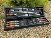 A set of skewers in a case Grill Box 2 Home-Complete Wood BBQ Grill Tool Set
