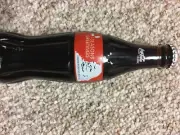 coca cola seasons greetings commemorative glass bottle unopened