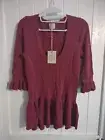 TORN by Ronny Kobo Medium Mauve Peplum Knit Top