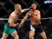 Conor McGregor hits Nate Diaz at UFC 202 Las Vegas, Nevada, 2016 12x8 Photo