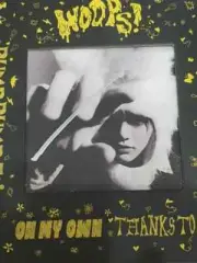 An autographed album with a written message from Woods
