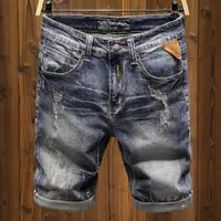 在飛比找ETMall東森購物網優惠-破洞夏天復古韓版5分牛仔短褲