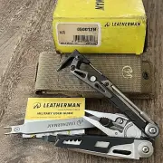Leatherman MUT w/Titanium Clip multi tool, dark brown molle sheath. Rare 03/2013