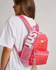 [Nike] Nike Brazilia Mini Backpack in Magic Flamingo/Red/White One Size Magic Flamingo/Red/White
